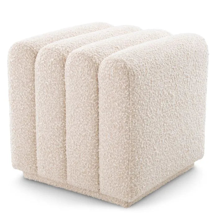 Cream boucl‚Äö√†√∂¬¨¬© Eichholtz Bente stool with sculptural channel design and rounded edges