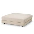 Eichholtz Ottoman Lounge Club Nuoro beige A square upholstered ottoman in a light beige fabric, shown from a three-quarter angle on a plain white background.