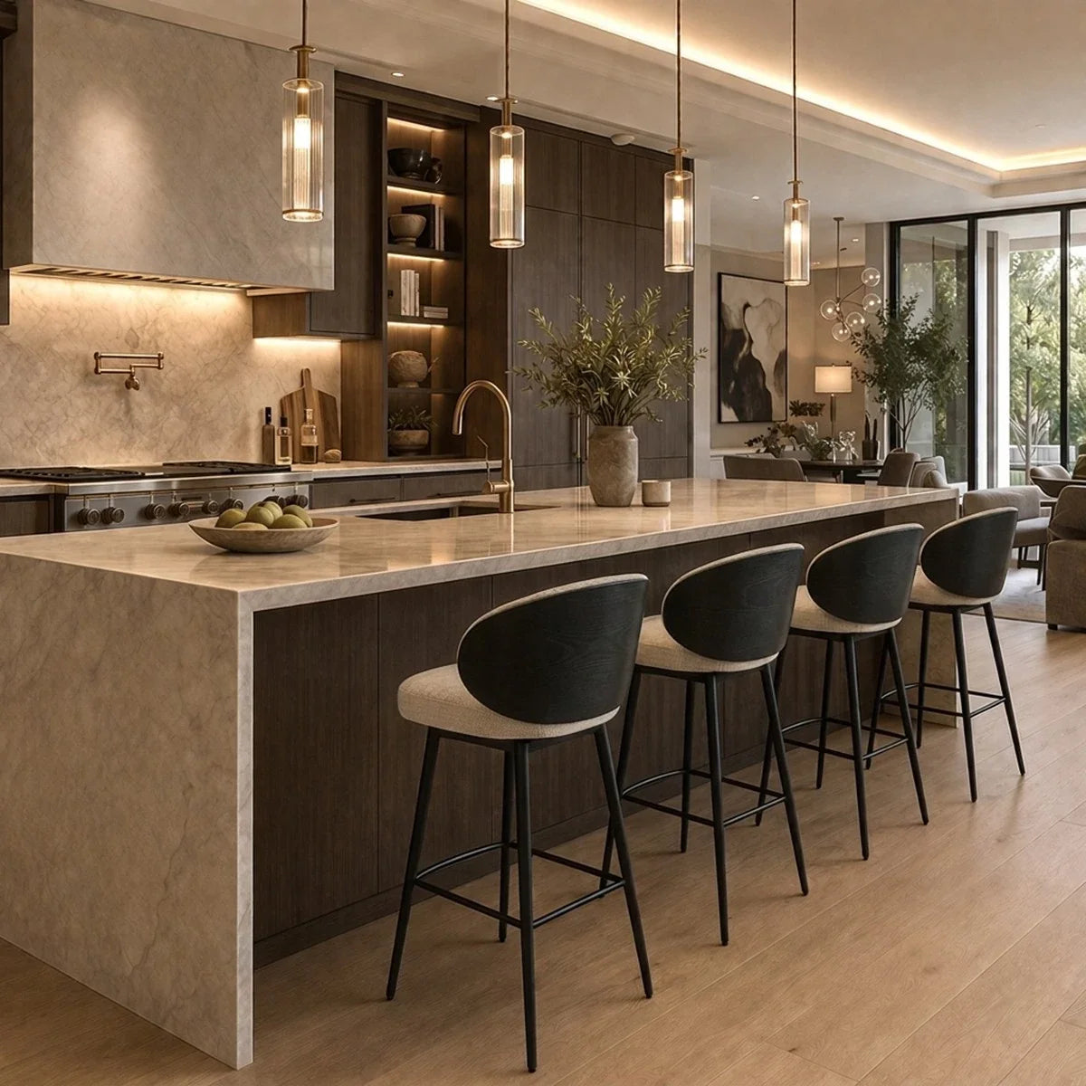 Eichholtz Counter Stool Camerota Scalea Sand. A modern kitchen island with a light stone countertop and dark wood cabinetry, surrounded by four black bar stools with light beige seats. The space is lit by four pendant lights and warm under-cabinet lighting, with a dining area visible in the background.
